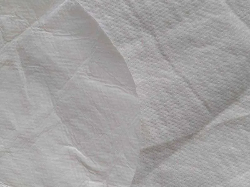 Close-up of a laser-cut edge on microporous breathable film laminate