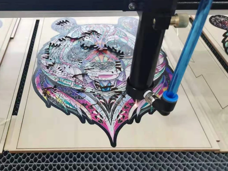 UV-printed plywood panels cut on a KASU CO2 laser cutter